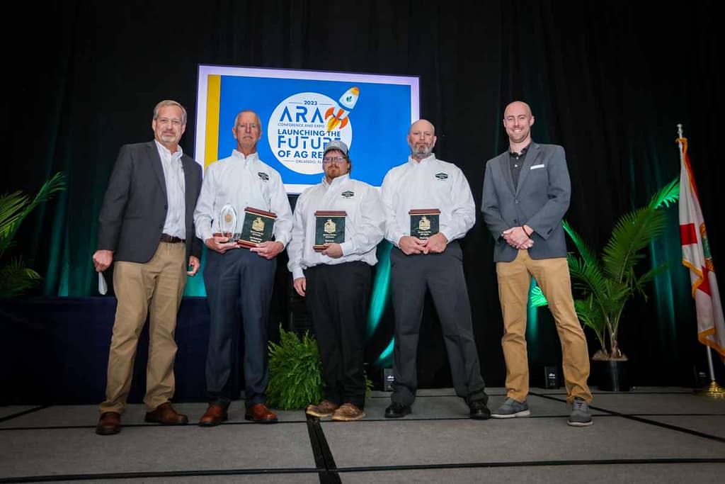 Photos of corporate people on stage