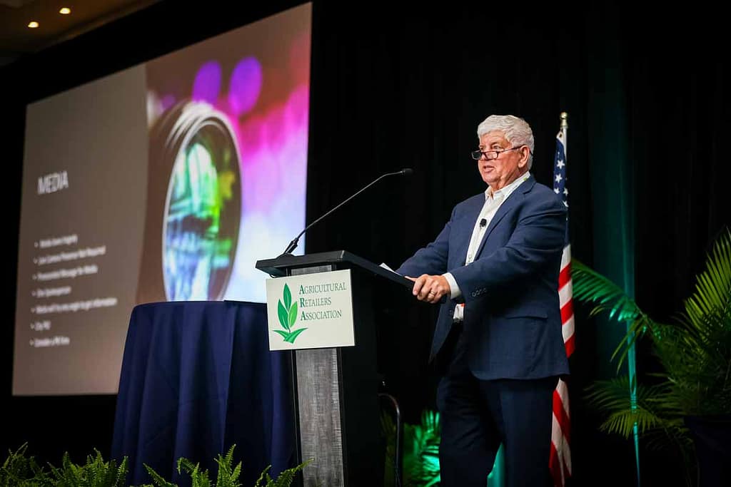 Photos of corporate people on stage